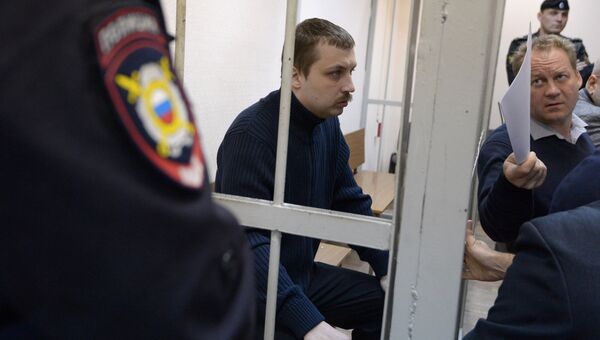 Михаил Косенко, обвиняемый по делу о беспорядках на Болотной площади в Москве 6 мая 2012 года. Архивное фото