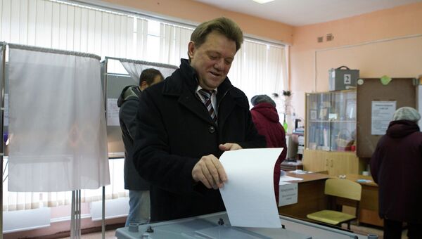 Иван Кляйн на избирательном участке в день выборов мэра Томска