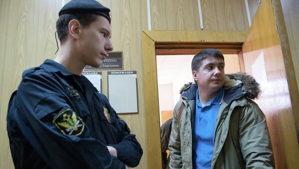 Бывший следователь Андрей Гривцов (справа), архивное фото