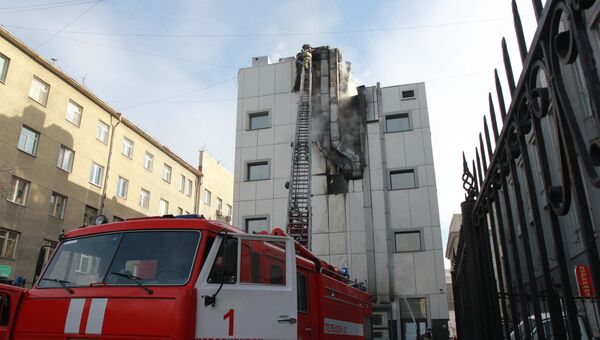 Пожар в ТЦ в центре Новосибирска, событийное фото