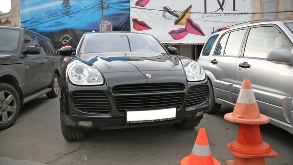 Автомобиль Porsche Cayenne. Архивное фото