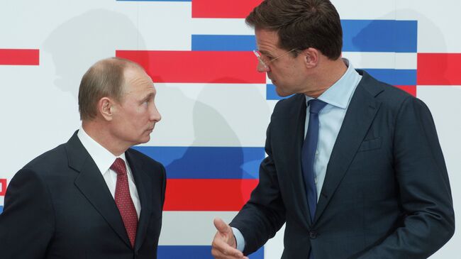 Президент России Владимир Путин (слева) и премьер-министр Королевства Нидерландов Марк Рютте. Архивное фото
