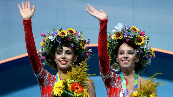 Маргарита Мамун (Россия) - золотая медаль, Яна Кудрявцева (Россия) - золотая медаль.