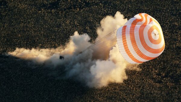 Спуск с МКС капсулы с Олимпийским факелом. Фото с места события