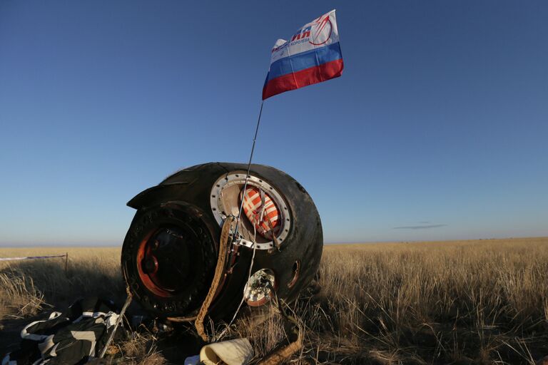 Спуск с МКС капсулы с Олимпийским факелом