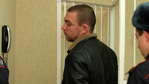 Экс-инспектор ДПС Алексея Мозго во время судебного заседания по избранию меры пресечения, архивное фото