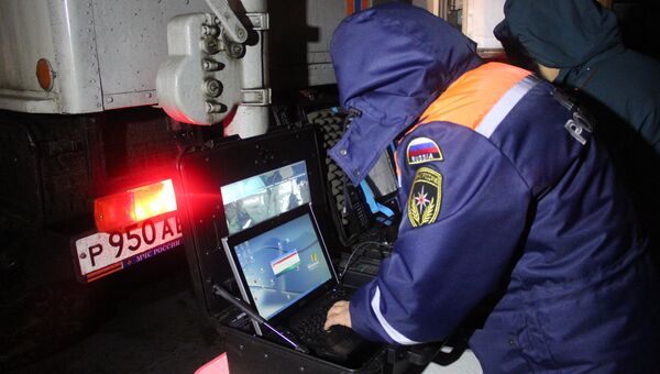 Работа спасателей на месте крушения самолета в Казани. Фото с места событий