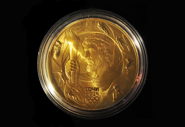 Памятная монета Прометей, представленная на презентации третьей и четвертой серий монетной программы Сочи 2014