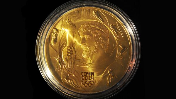 Памятная монета Прометей, представленная на презентации третьей и четвертой серий монетной программы Сочи 2014