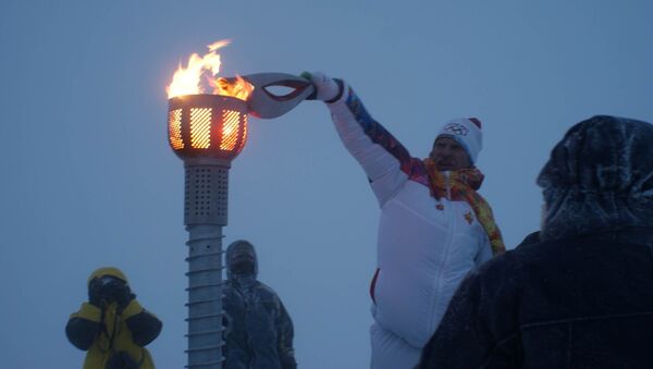 Олимпийский факел на горе Облачная в Приморье. Фото с места события.
