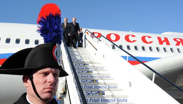 Владимир Путин во время прибытия в аэропорт Триеста. Фото с места события