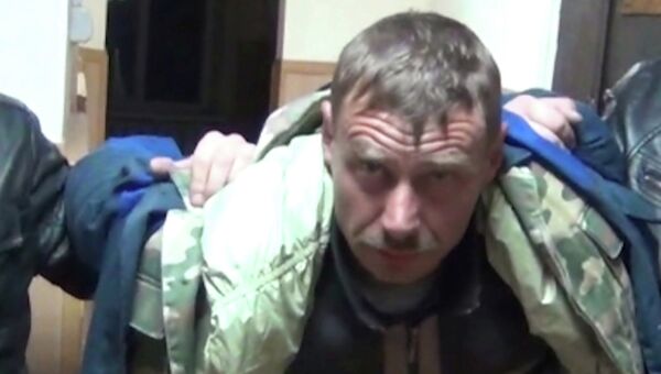 Подозреваемый в убийстве четырех человек в станице Староминская Краснодарского края Евгений Марушко во время задержания оперативниками