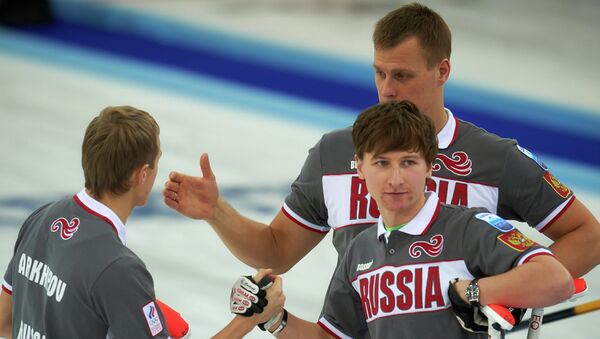Российские спортсмены Евгений Архипов, Петр Дрон и Андрей Дроздов (слева направо)