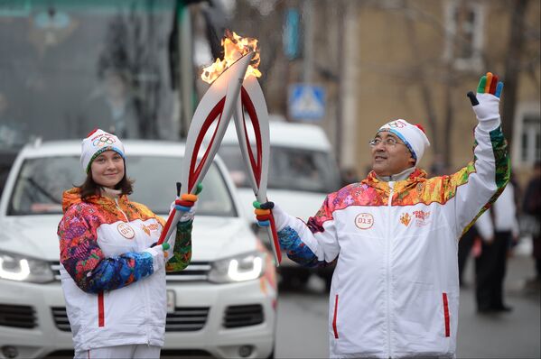 Ректоры, студенты и спортсмены: кто нес олимпийский огонь в Томске