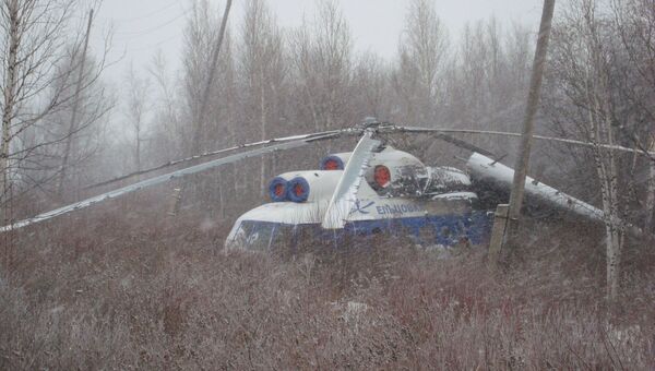 Вертолет вынужденно сел в Томской области, событийное фото