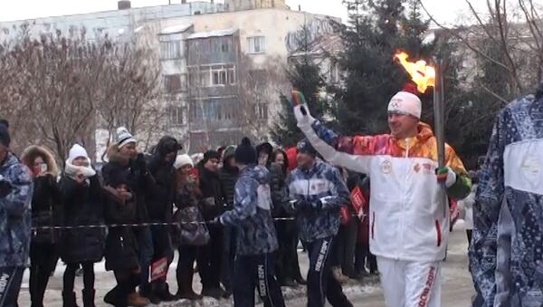 Огонь ОИ пронесли мимо вольеров с животными-символами Игр  в Новосибирске