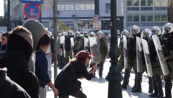 Шествие в Афинах в годовщину убийства подростка полицейскими