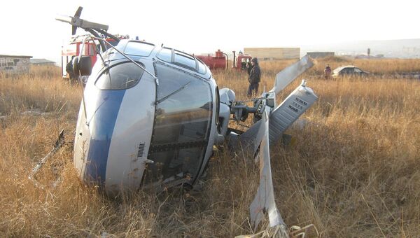 На месте падения вертолета АС-350 в городе Ужур Красноярского края