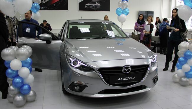 На открытии автосалона Mazda в Томске, событийное фото