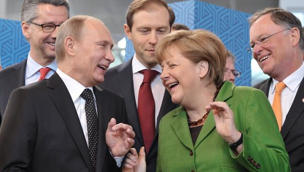 Президент России Владимир Путин и канцлер Германии Ангела Меркель. Архивное фото