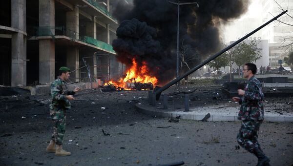 На месте взрыва в центре Бейрута. 27 декабря 2013