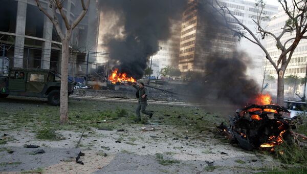 На месте взрыва в центре Бейрута. 27 декабря 2013. Архивное фото