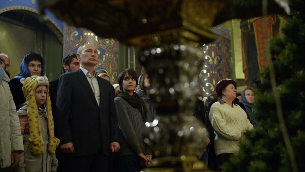 В.Путин посетил Рождественское богослужение. Фото с места события