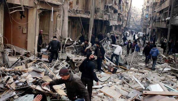 Последствия авиаударов в Алеппо, декабрь 2013. Архивное фото