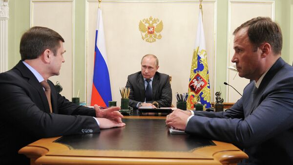 В.Путин провел рабочую встречу с О.Остапенко и И.Комаровым