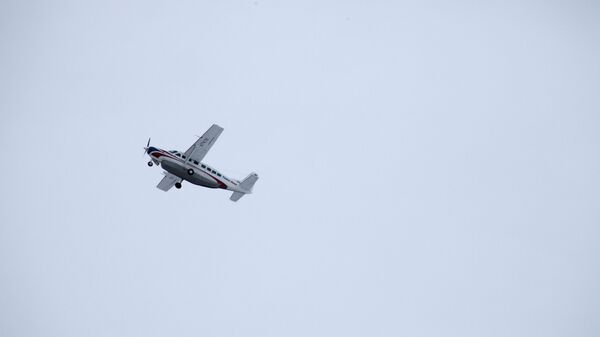 Cамолет Cessna во время совершения воздушного Крестного хода над Томском