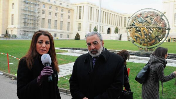 Министр связи Сирии Омран аз-Зоуби на переговорах в Женеве. Фото с места события