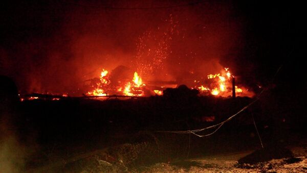 Пожар уничтожил восемь домов в Приамурье, фото с места события
