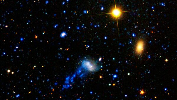 Галактика медуза. Скопление Девы. Скопление Девы фото. Скопление четырнадцати галактик spt2349-56.