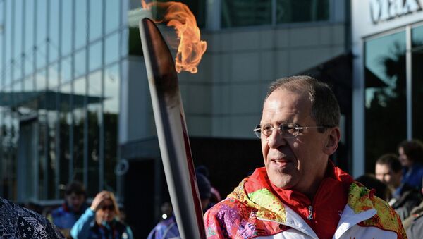 Министр иностранных дел России Сергей Лавров во время эстафеты Олимпийского огня в Сочи.