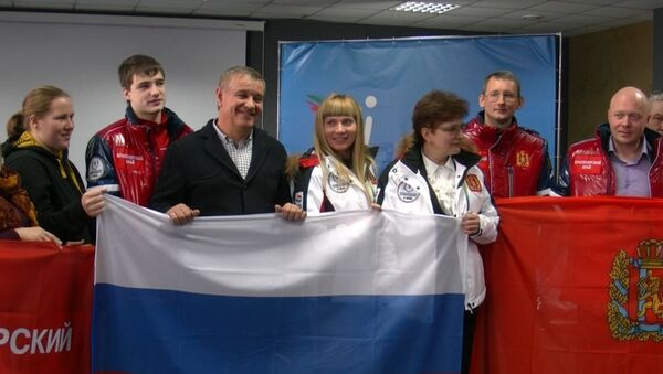 Счастливый свитер и 4-метровый шарф взяли красноярцы на Олимпиаду в Сочи