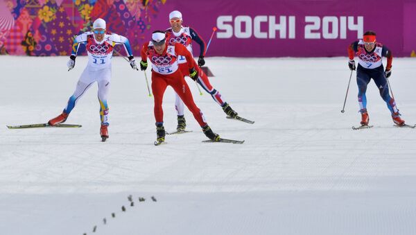 Слева направо: Маркус Хельнер (Швеция), Дарио Колонья (Швейцария), Мартин Йонсруд Сундбю (Норвегия), Максим Вылегжанин (Россия) на финише скиатлона
