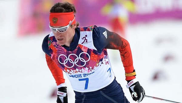 Максим Вылегжанин (Россия) на дистанции скиатлона в соревнованиях по лыжным гонкам среди мужчин на XXII зимних Олимпийских играх в Сочи