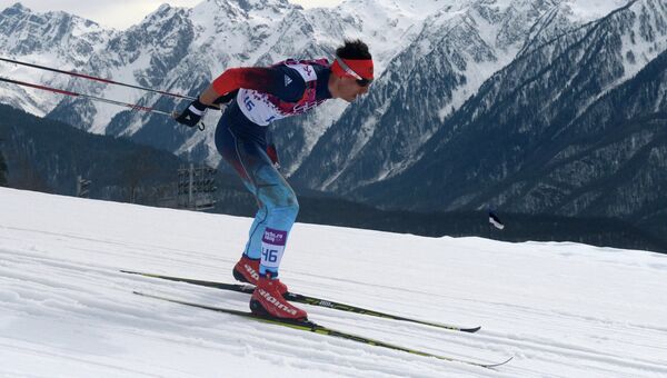 Евгений Белов (Россия) на соревнованиях по лыжным гонкам. Архивное фото