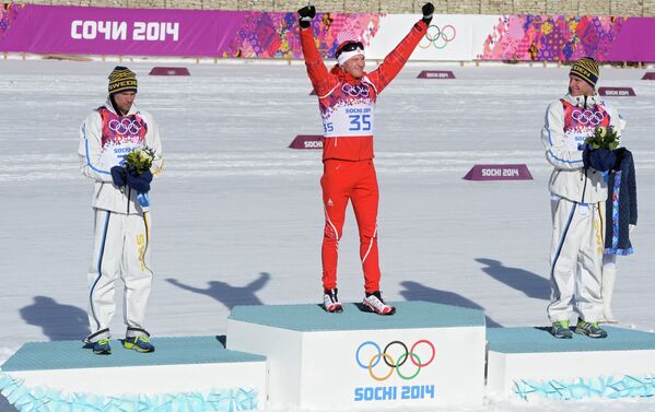 Юхан Ольссон (Швеция) - серебряная медаль, Дарио Колонья (Швейцария) - золотая медаль, Даниэль Риккардссон (Швеция) - бронзовая медаль в лыжных гонках