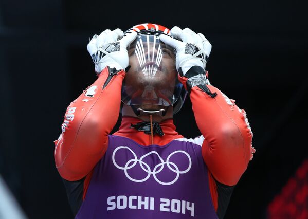 Бруно Банани (Тонга) во время тренировочного заезда в группе А среди мужчин перед XXII зимними Олимпийскими играми в Сочи.