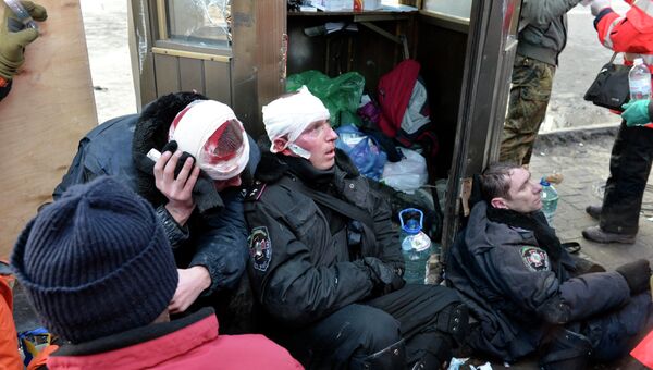 Пострадавшие полицейские в ходе беспорядков в Киеве