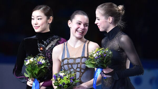 Ким Ю На (Южная Корея) - серебряная медаль, Аделина Сотникова (Россия) - золотая медаль, Каролина Костнер (Италия) - бронзовая медаль