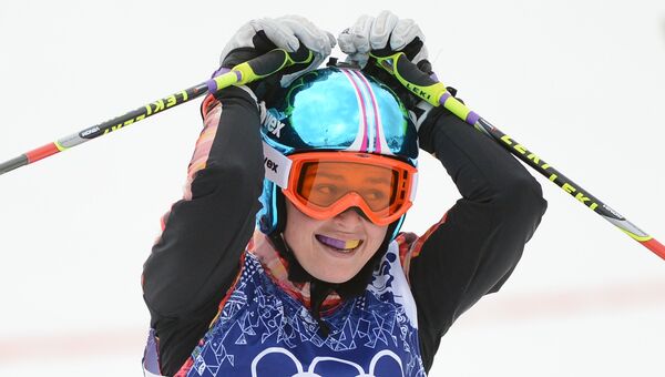 Мариэль Томпсон (Канада), завоевавшая золотую медаль, после окончания финала ски-кросса
