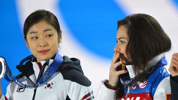 Ким Ю На (Южная Корея) - серебряная медаль, Аделина Сотникова (Россия) - золотая медаль