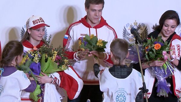 Цветы и овации  – как встречали в Москве олимпийскую сборную России