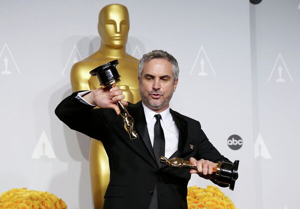 Мексиканский кинорежиссёр, сценарист и продюсер Альфонсо Куарон на 86-й церемонии вручения премии Оскар