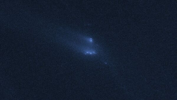 Распад астероида P/2013 R3, Архивное фото