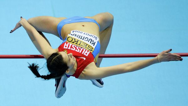 Российская легкоатлетка Кучина завоевала золото ЧМ в прыжках в высоту, фото с места события