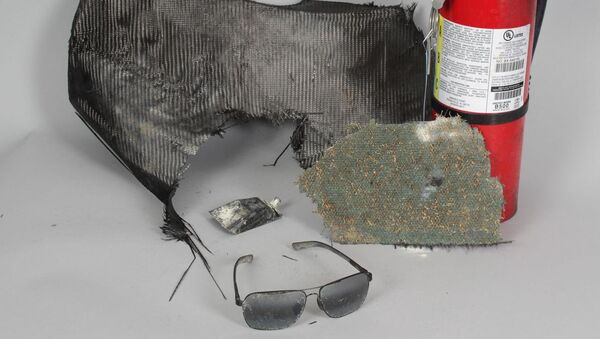 Очки Пола Уокера, небольшой фрагмент автомобиля, в котором находился Уокер, и огнетушитель, с помощь которого тушили транспортное средство, выставленные на аукцион