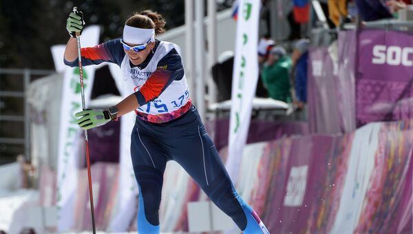 Анна Миленина (Россия) на финише гонки на XI Паралимпийских зимних играх в Сочи